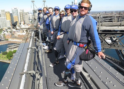 BridgeClimb - Adaptive Surf team, and Walk for Waves participants at the summit of the Sydney Harbour Bridge