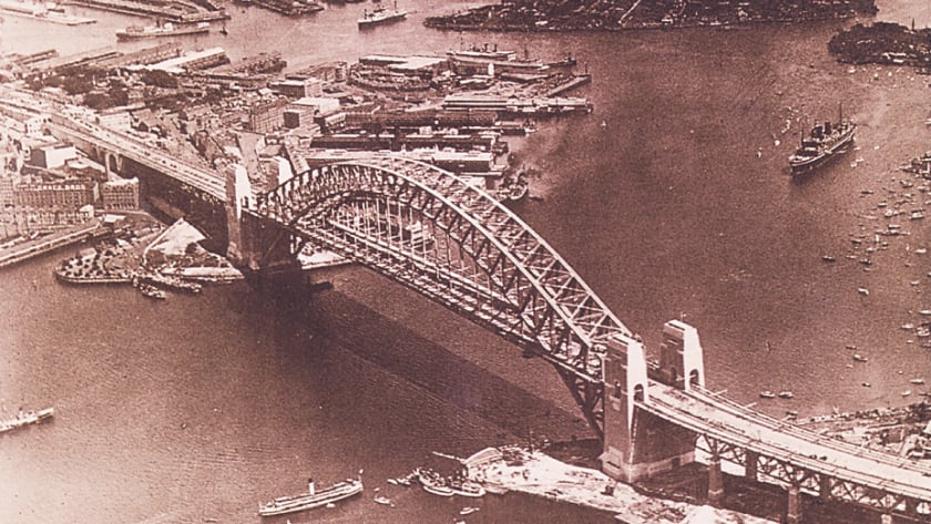 sepia aerial photo of the sydney harbour bridge