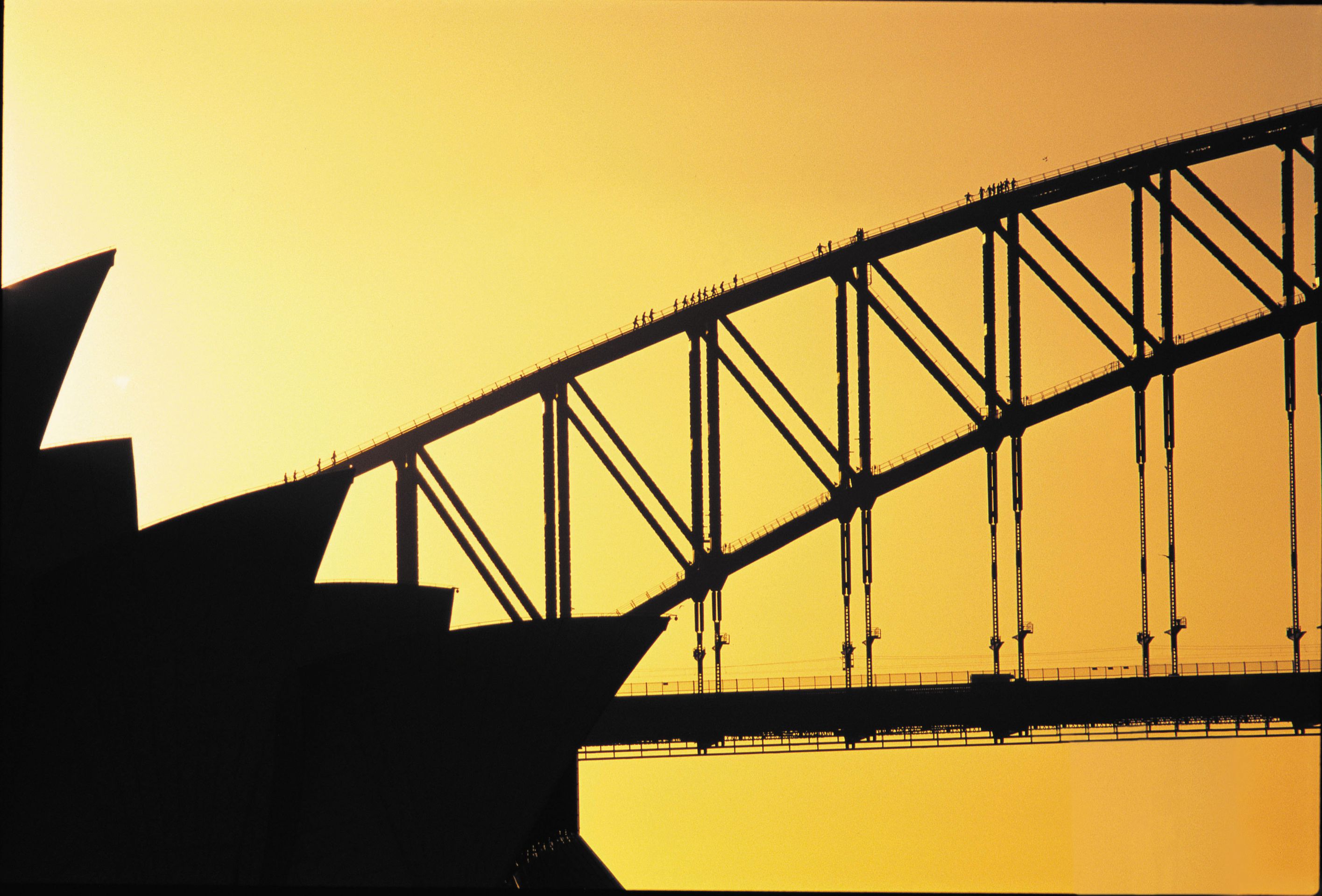 silhouette of sydney opera house and sydney harbour bridge