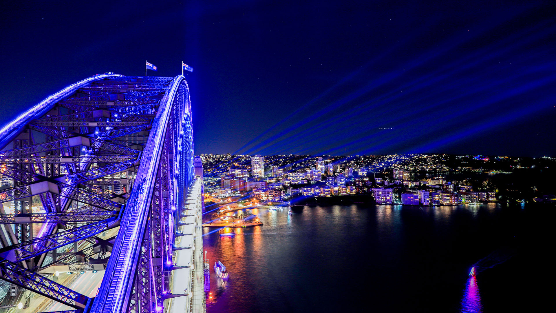 Sydney Harbour Bridge lit up purple for Vivid Sydney