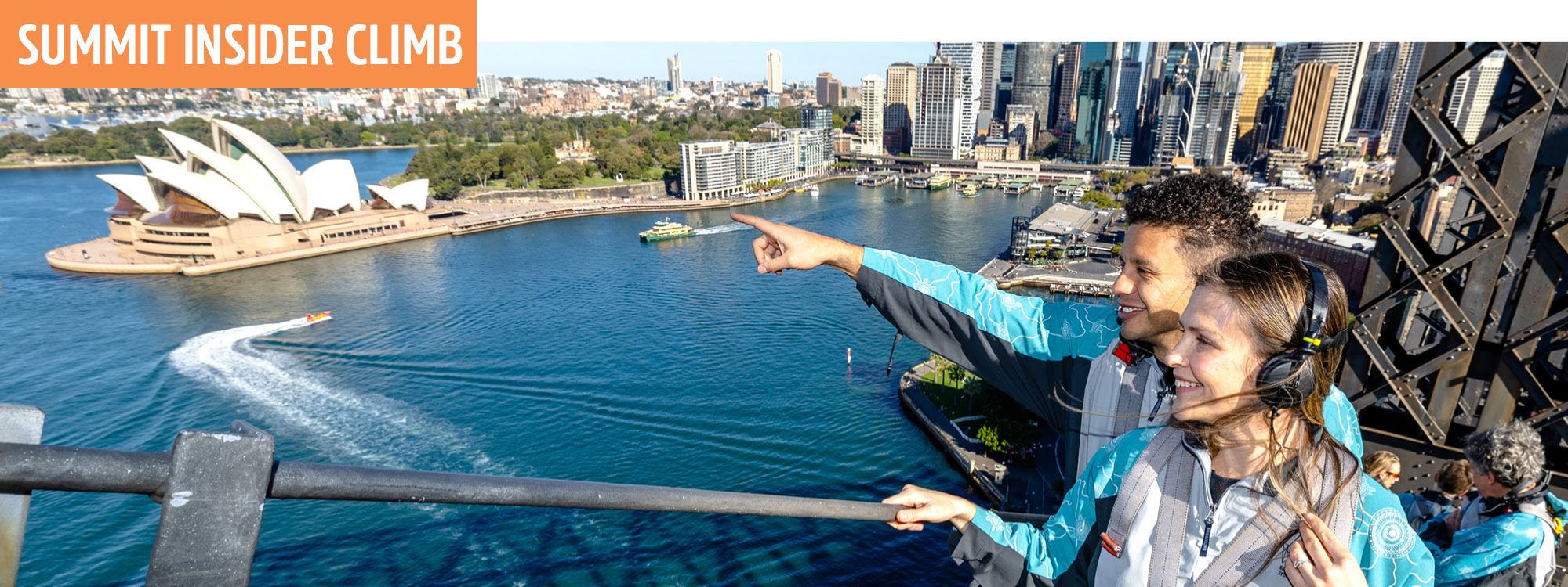 group of climbers enjoying a summit insider climb looking out at the harbour
