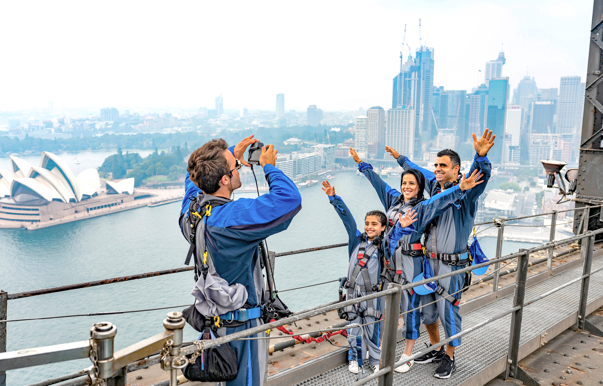 Family climbs Sydney Harbour Bridge after Bridgeclimb's reopening