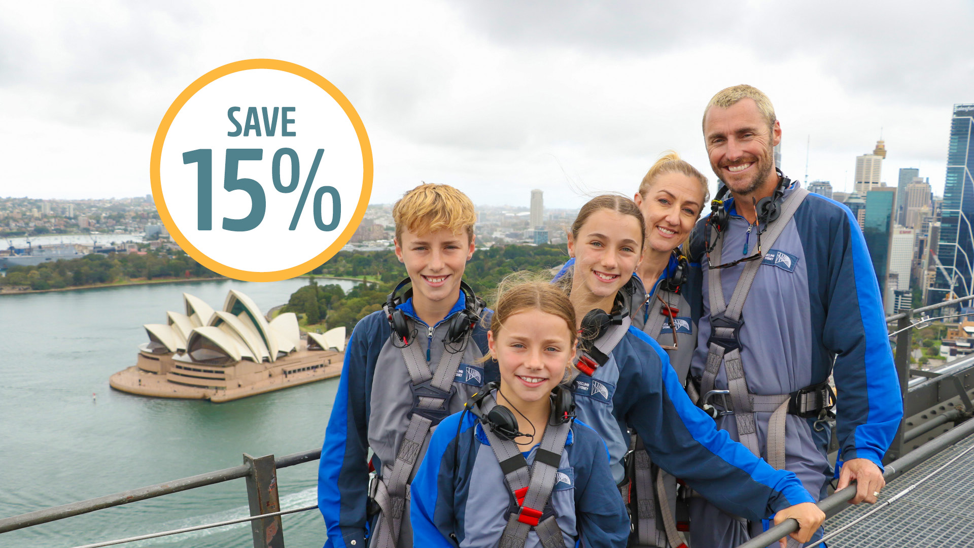 family of four climbing stairs on the sydney harbour bridge on the summit insider bridgeclimb experience