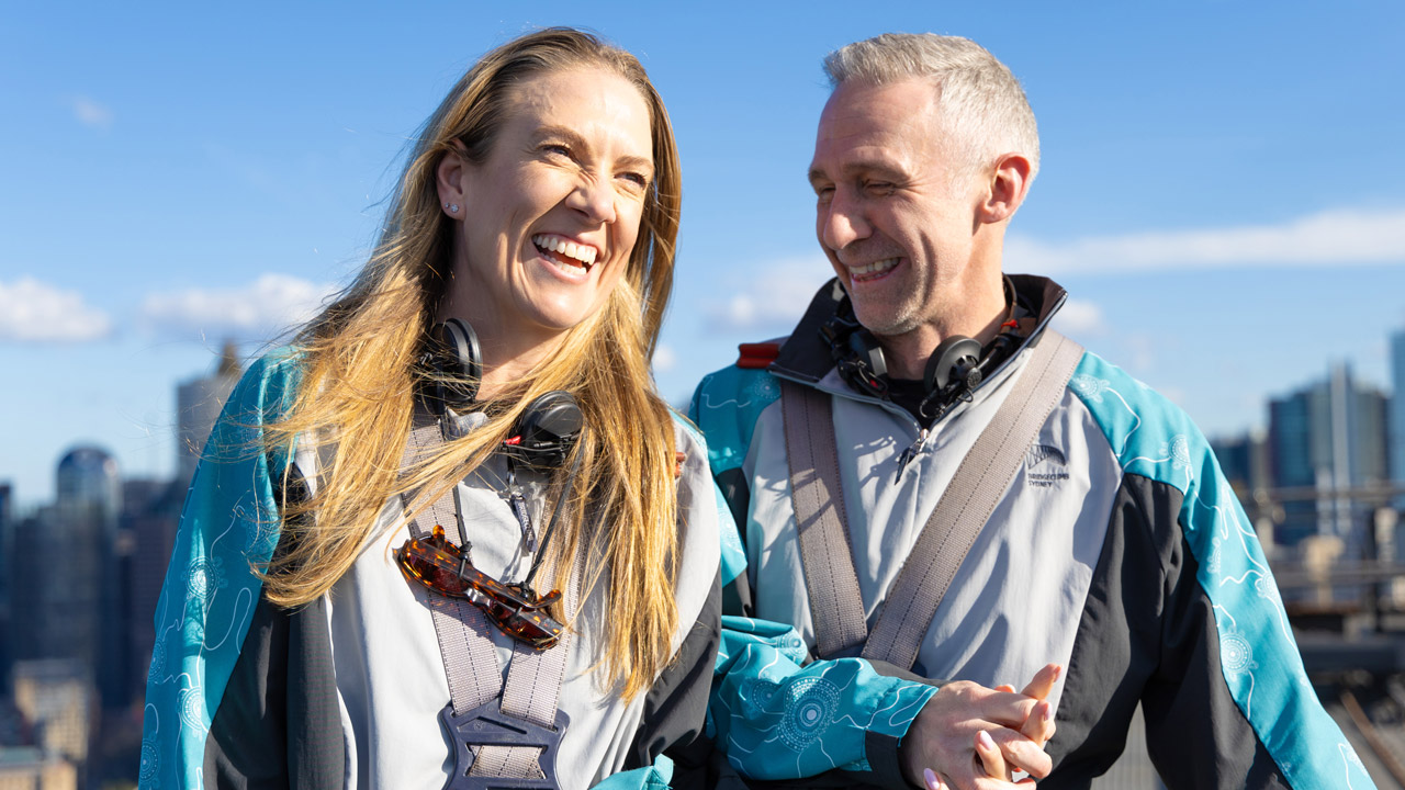 couple smiling at the summit