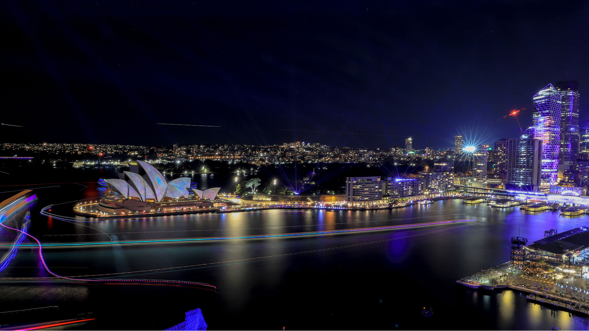 sydney harbour lit up during vivid sydney