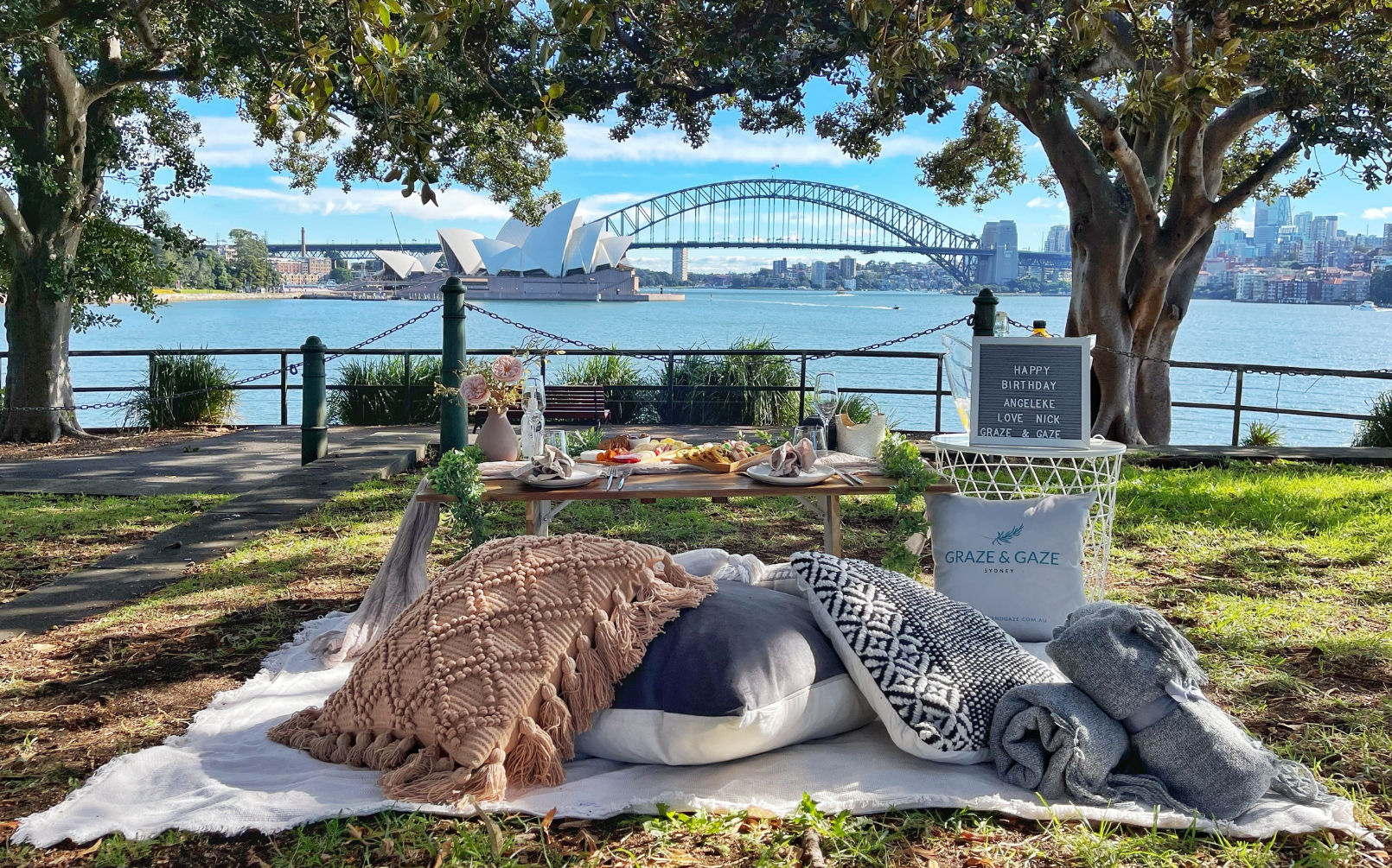 View of BridgeClimb Sydney from a picnic spot at Mrs Macquarie's chair